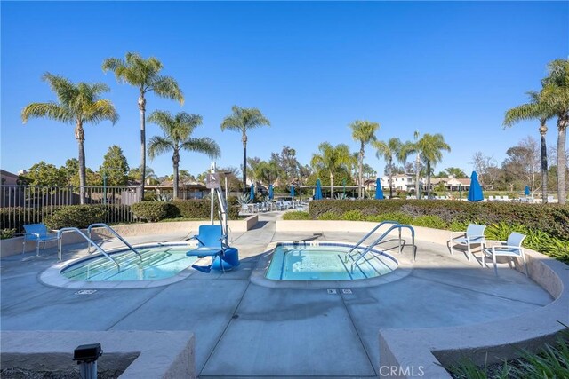 view of swimming pool featuring a patio area