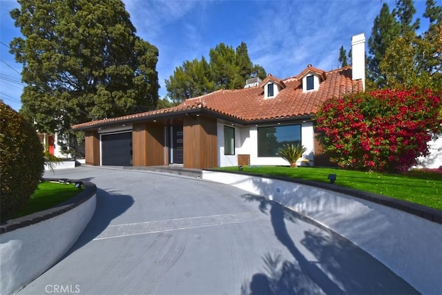 view of front of home with a garage