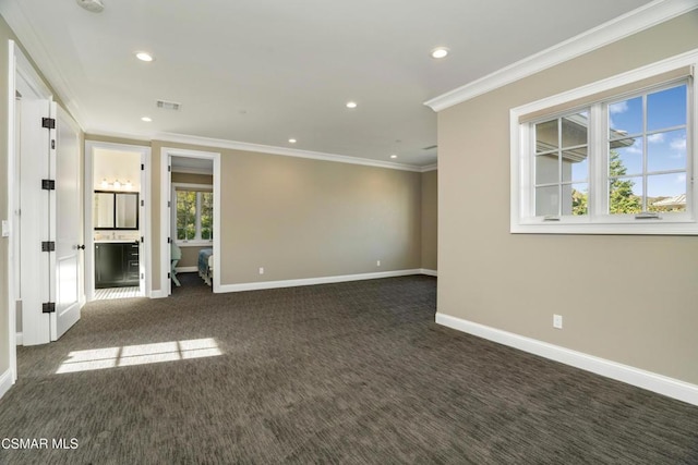 carpeted empty room with ornamental molding