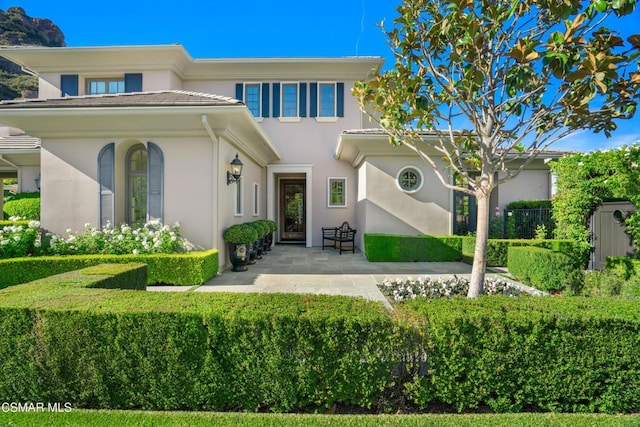 view of front of house with a patio area