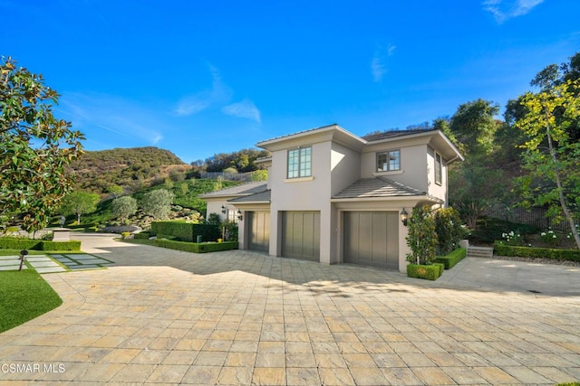 view of property exterior featuring a garage