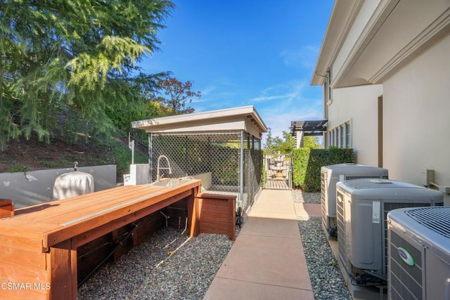 view of patio with cooling unit