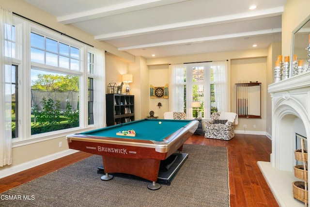 rec room featuring beam ceiling, a wealth of natural light, dark wood-type flooring, and billiards