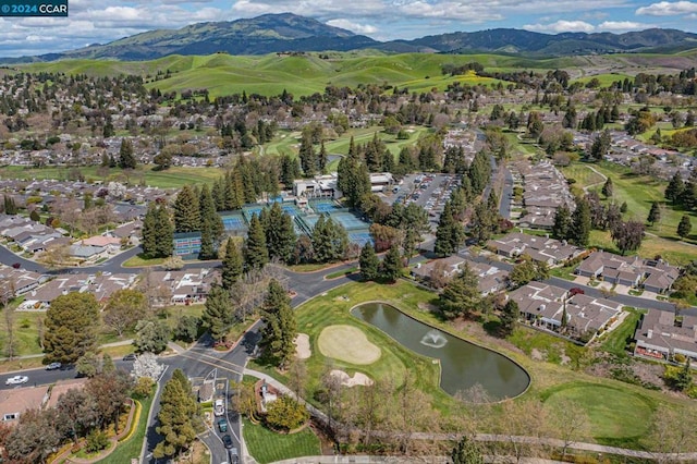 bird's eye view featuring a water and mountain view