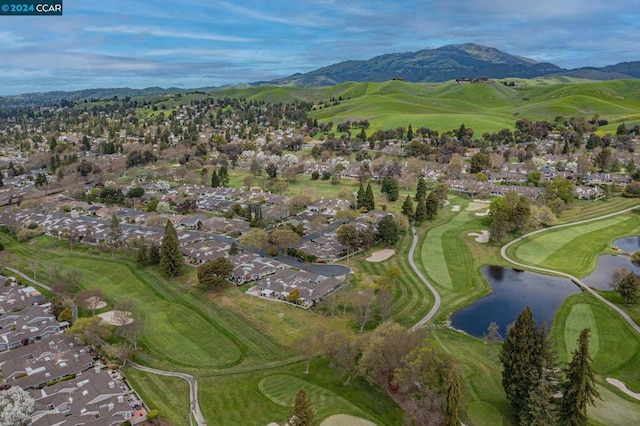 bird's eye view featuring a water and mountain view