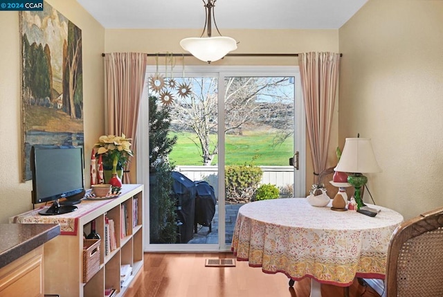 sitting room featuring hardwood / wood-style floors