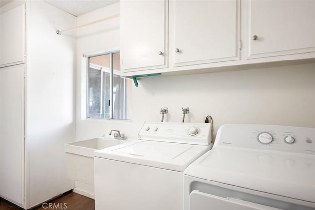 washroom featuring independent washer and dryer and dark hardwood / wood-style floors