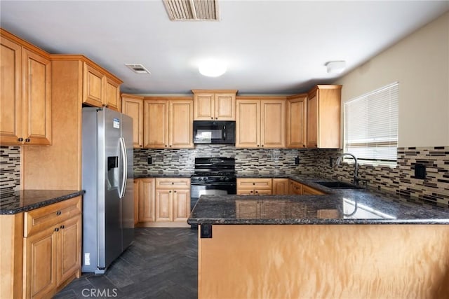 kitchen featuring kitchen peninsula, sink, dark parquet floors, and black appliances