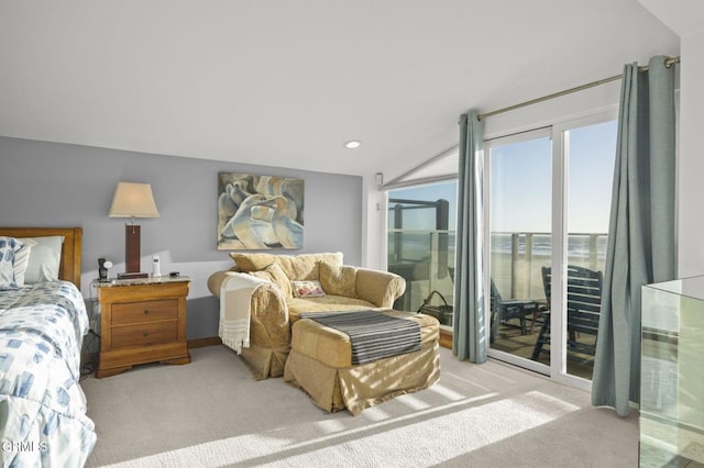 bedroom with a water view, lofted ceiling, light carpet, and access to outside