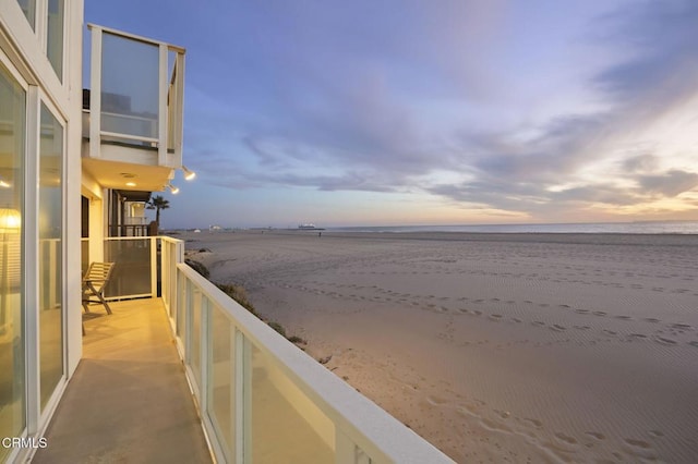 view of water feature with a beach view