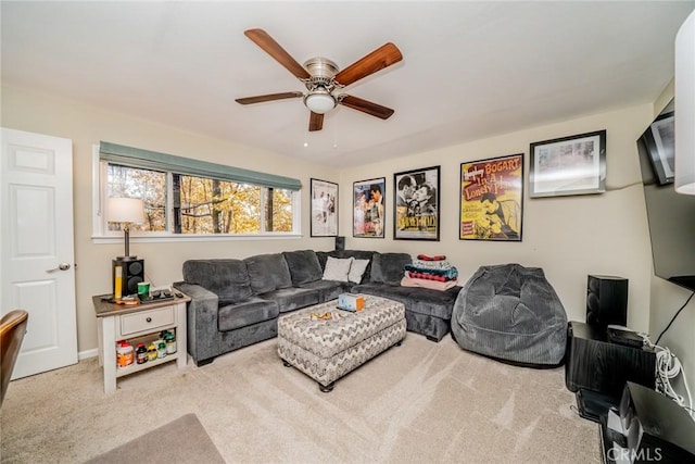 living room with carpet floors and ceiling fan