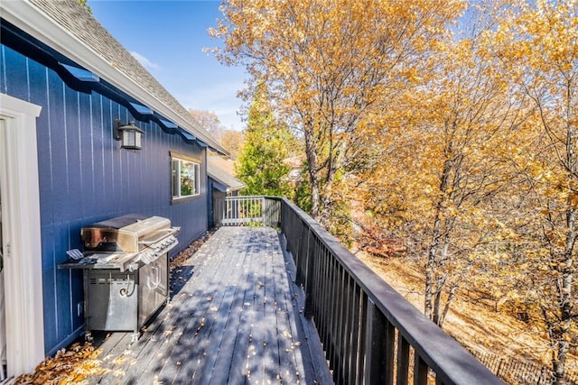 wooden deck with area for grilling