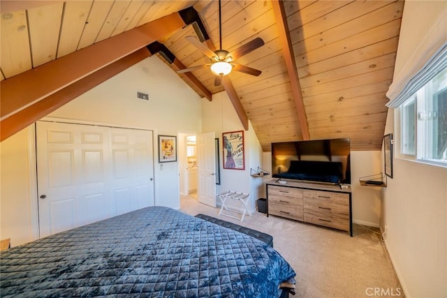 bedroom featuring light carpet, wood ceiling, ceiling fan, lofted ceiling with beams, and a closet