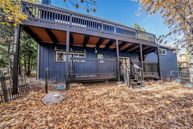 1181 Voltaire Dr, Lake Arrowhead, CA 92352 - back of house with a wooden deck and board and batten siding