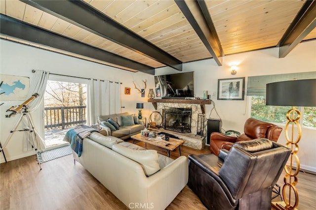 1181 Voltaire Dr, Lake Arrowhead, CA 92352 - living area featuring a fireplace, wood finished floors, and a wooden ceiling with exposed beams