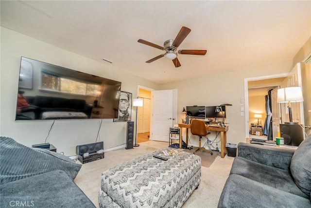 1181 Voltaire Dr, Lake Arrowhead, CA 92352 - living area with light carpet, ceiling fan, and a desk