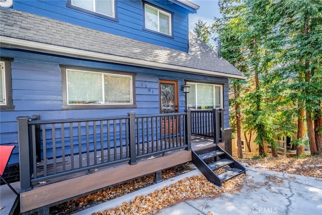 1181 Voltaire Dr, Lake Arrowhead, CA 92352 - entrance to property with roof with shingles and a wooden deck