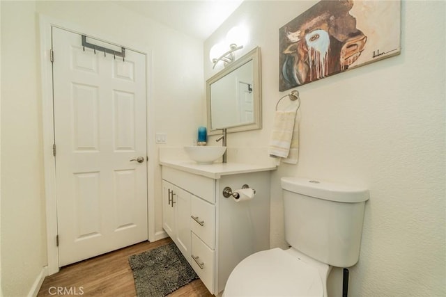 1181 Voltaire Dr, Lake Arrowhead, CA 92352 - half bath featuring vanity and wood finished floors