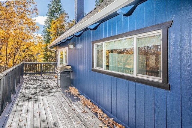 wooden terrace with grilling area