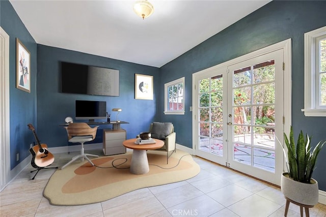 interior space featuring french doors and light tile patterned floors