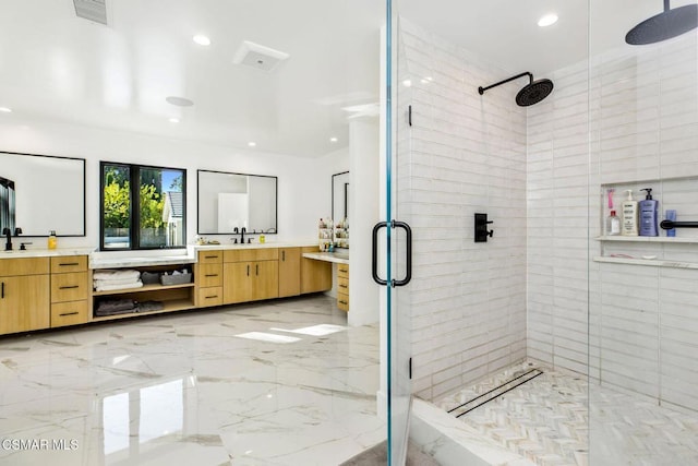 bathroom featuring vanity and walk in shower