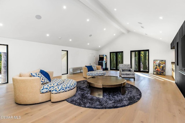 living room with beamed ceiling, french doors, light wood-type flooring, and high vaulted ceiling