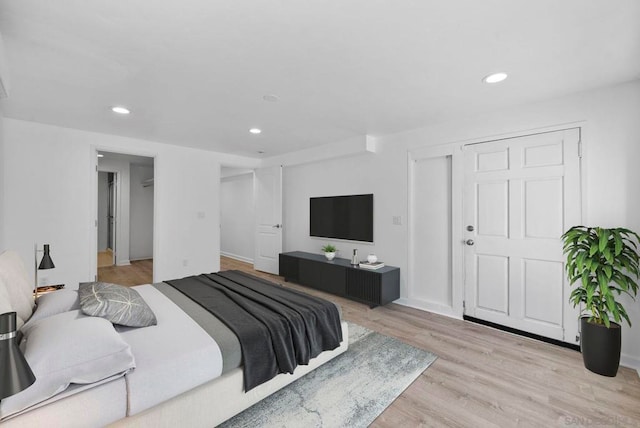 bedroom featuring light hardwood / wood-style floors