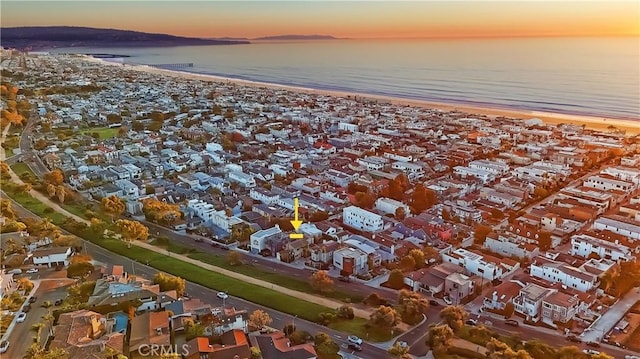 birds eye view of property with a residential view and a water view