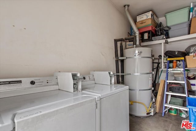 washroom featuring separate washer and dryer and water heater