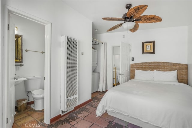 bedroom with ensuite bathroom and ceiling fan