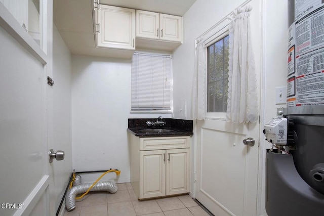 interior space with vanity and tile patterned floors