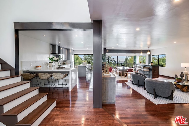 living room featuring dark hardwood / wood-style floors