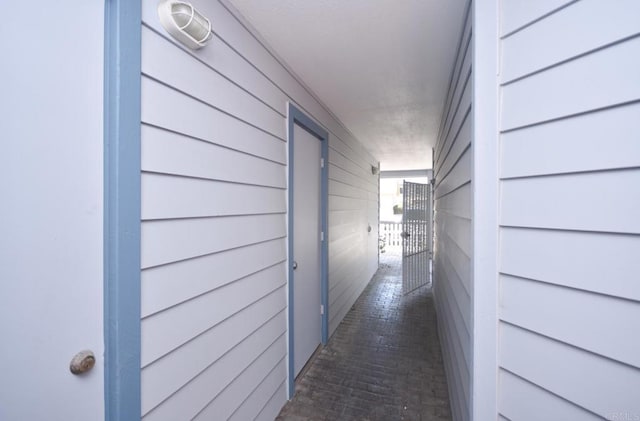 corridor with wooden walls