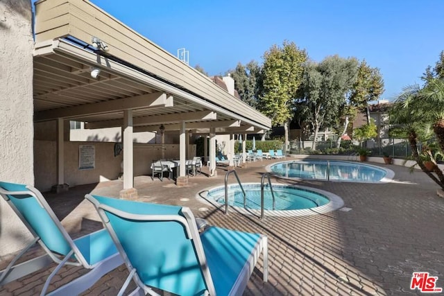 view of pool with a patio area