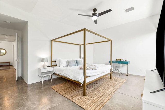 bedroom featuring ceiling fan and concrete floors