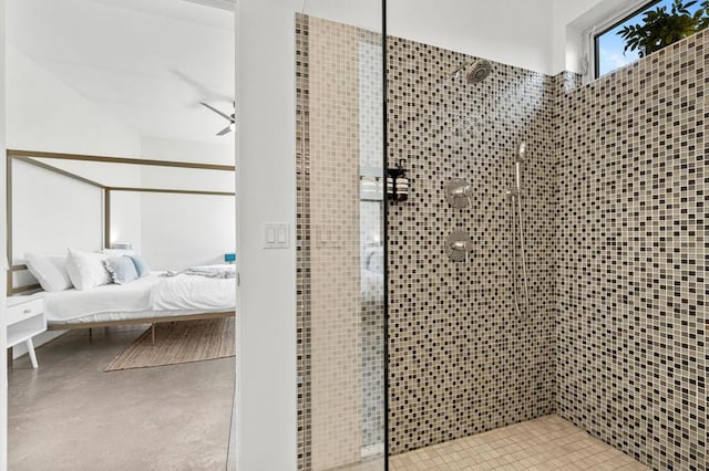 bathroom with tiled shower