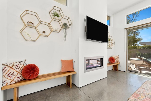 living room with concrete floors