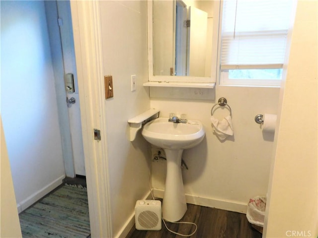 bathroom featuring hardwood / wood-style floors and sink