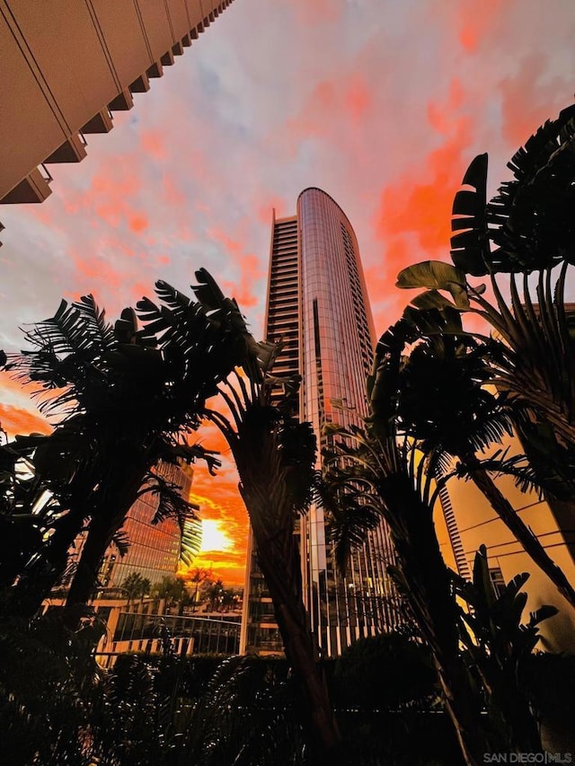 view of outdoor building at dusk