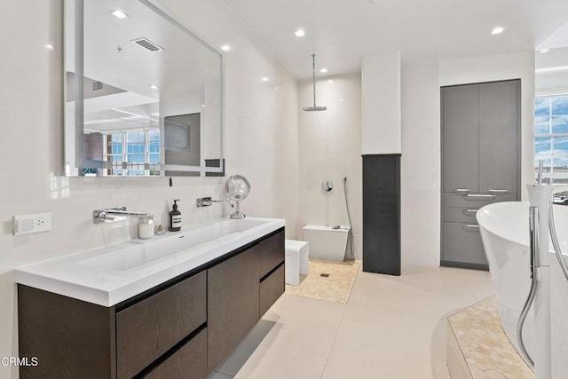 bathroom with tile patterned flooring, vanity, decorative backsplash, and plus walk in shower