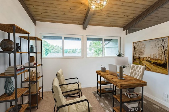 home office featuring carpet, a wealth of natural light, and beamed ceiling