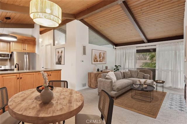 carpeted living room featuring beam ceiling, high vaulted ceiling, wooden ceiling, and sink