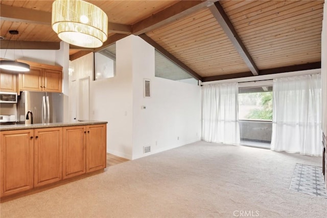 unfurnished living room with sink, beamed ceiling, high vaulted ceiling, light carpet, and wood ceiling