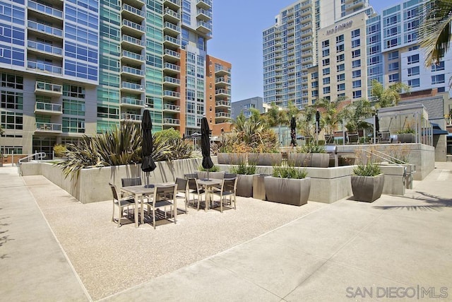 view of home's community with a patio