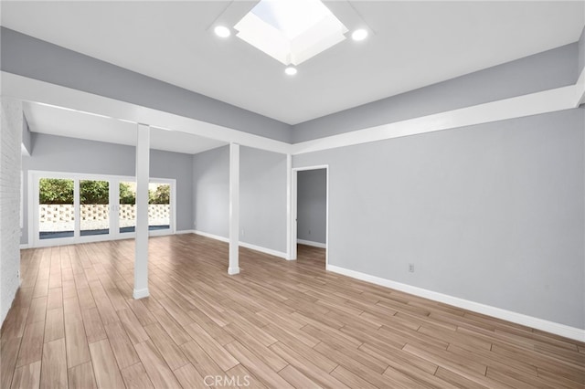 unfurnished room with light hardwood / wood-style flooring