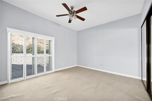 unfurnished bedroom with carpet flooring and ceiling fan