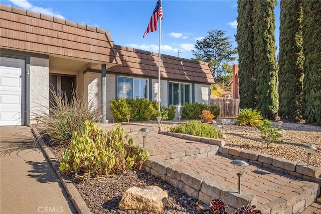 exterior space with a garage