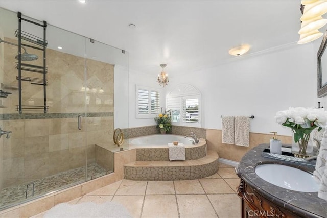 bathroom featuring plus walk in shower, tile patterned flooring, and vanity