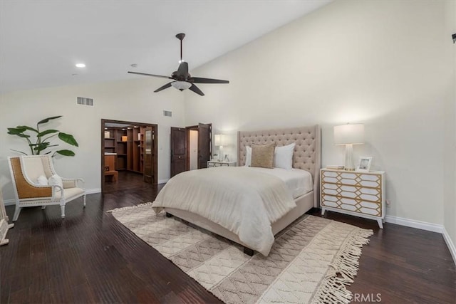 bedroom with wood-type flooring, high vaulted ceiling, and ceiling fan