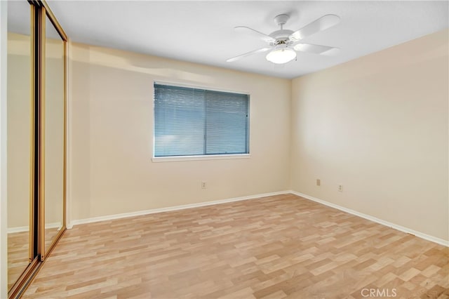 interior space with light wood-type flooring and ceiling fan